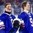 BUFFALO, NEW YORK - DECEMBER 29: USA's Adam Fox #8 and Josh Norris #9 sing their national anthem after a shootout win over Team Canada during preliminary round action at the 2018 IIHF World Junior Championship. (Photo by Andrea Cardin/HHOF-IIHF Images)

